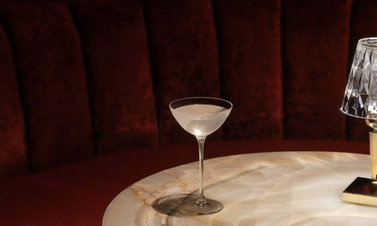 A cocktail glass in warm light